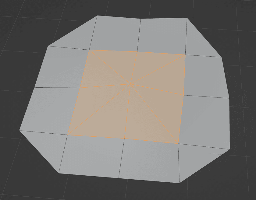 A screenshot of a mesh rendered in Blender in edit mode.  It's subdivided up into many different faces and N-gons.  There are are a variety of faces that fan all the way around a center orange vertex, and all are highlighted.